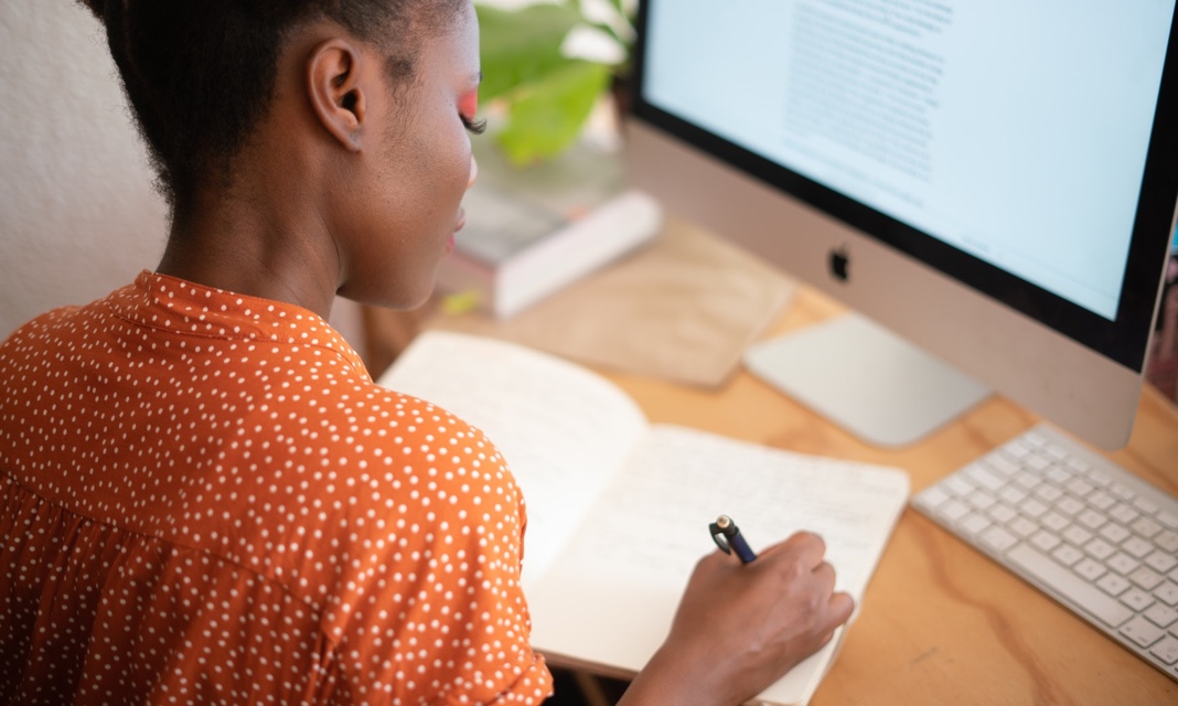 a woman is writing