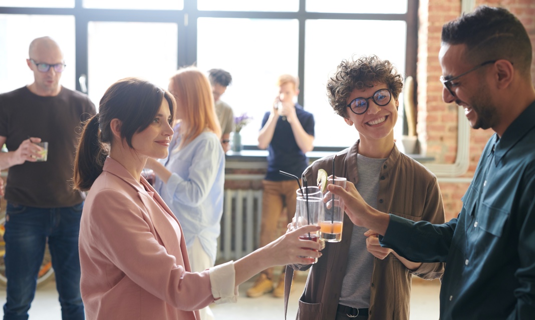 people are holding glasses